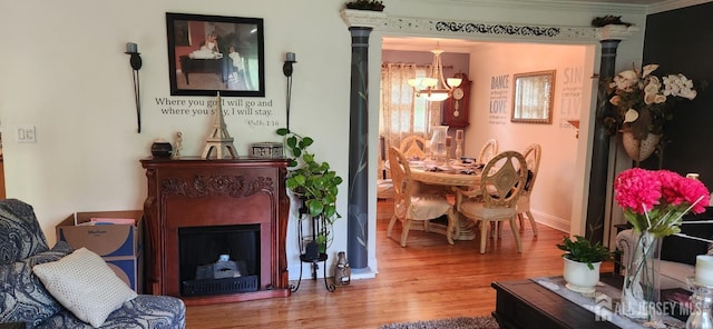95 Gravel Hill-Spotswood Rd, Monroe, NJ 08831 - living area with a chandelier, wood finished floors, a fireplace, and baseboards