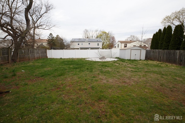 150 Montrose Ave, South Plainfield, NJ 07080 - fenced backyard with a storage unit