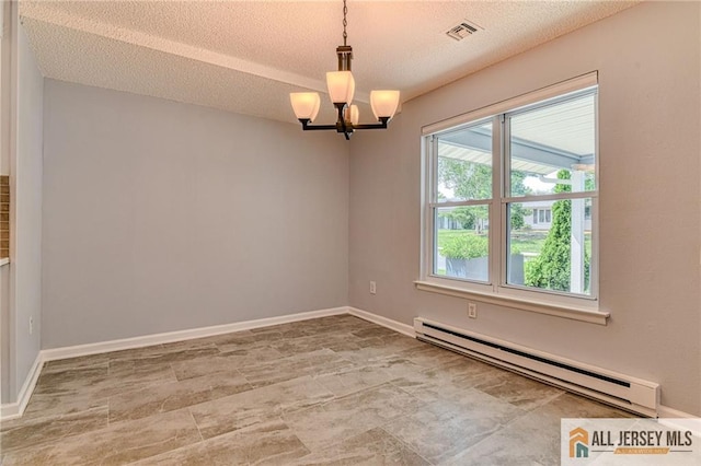 73 Chatham Dr Unit 73A, Monroe, NJ 08831 - spare room with a baseboard radiator, a chandelier, a textured ceiling, and baseboards