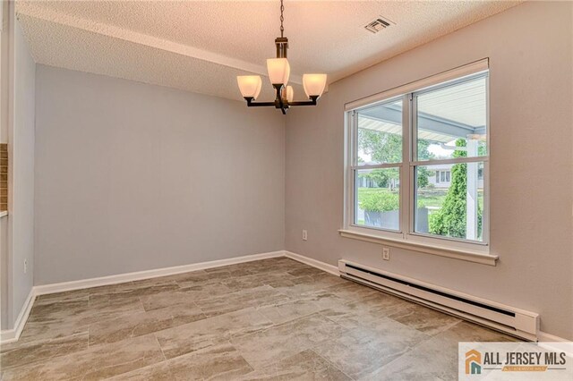 73 Chatham Dr Unit 73A, Monroe, NJ 08831 - unfurnished room with a baseboard radiator, a chandelier, and a textured ceiling