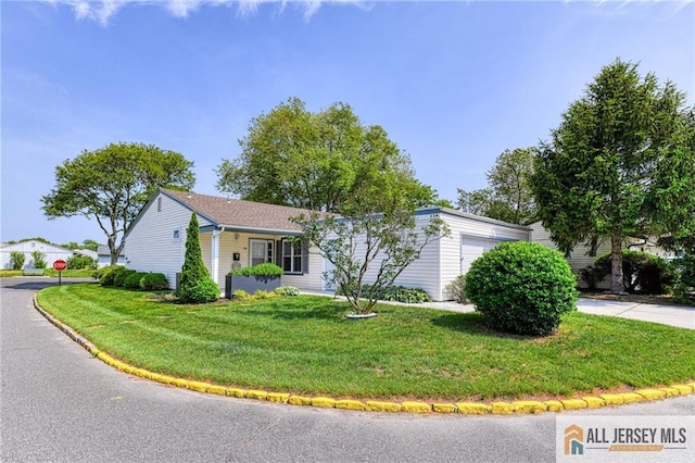 73 Chatham Dr Unit 73A, Monroe, NJ 08831 - view of front of house featuring a garage, a front yard, and driveway