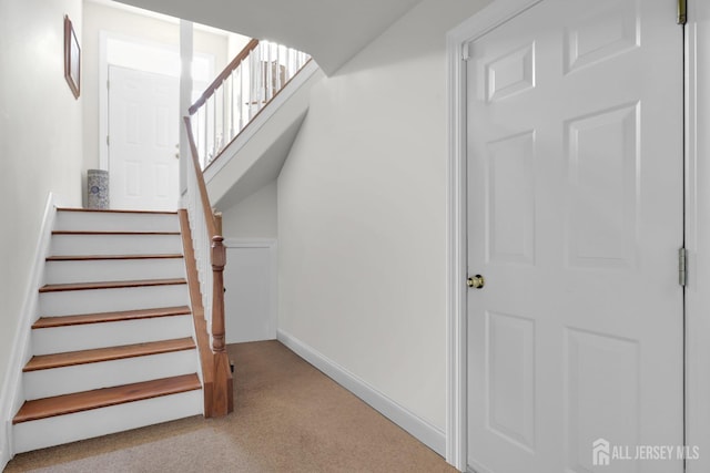 stairs with carpet floors