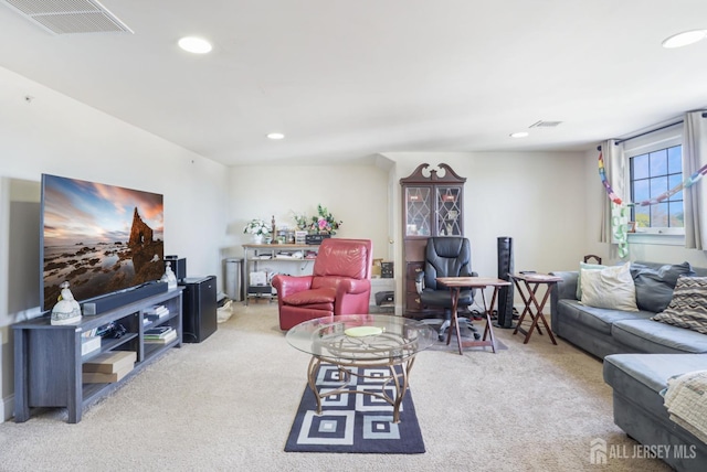 living room featuring light carpet