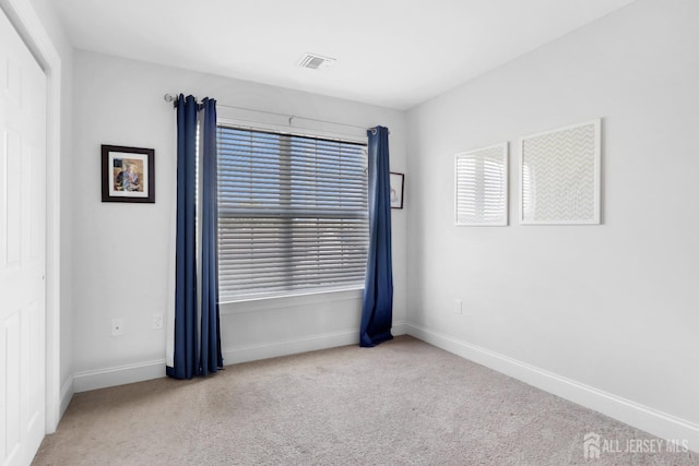 view of carpeted empty room