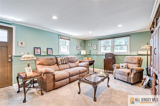 living area featuring crown molding, healthy amount of natural light, recessed lighting, carpet floors, and baseboards