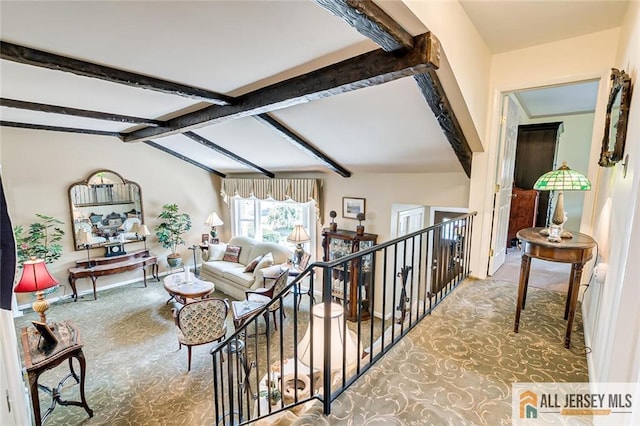 living room featuring carpet and baseboards