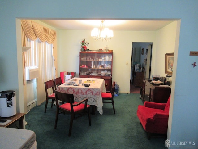 dining room featuring carpet floors, a baseboard radiator, and an inviting chandelier