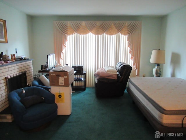 carpeted bedroom featuring a brick fireplace