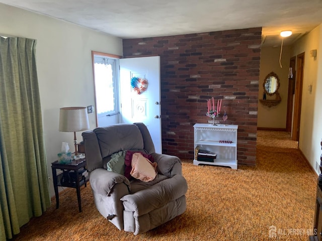 carpeted living room featuring baseboards