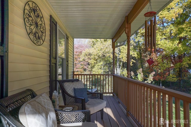 deck featuring covered porch