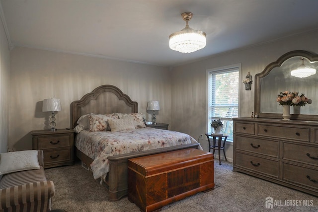 bedroom featuring crown molding and light carpet