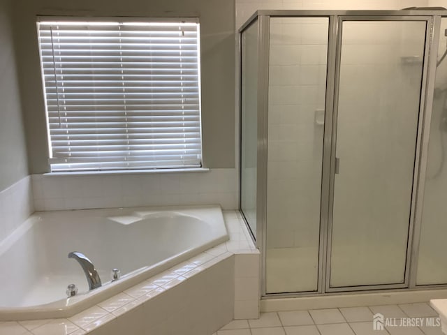 931 Cedar Ct, New Brunswick, NJ 08901 - full bathroom with a shower stall and a bath