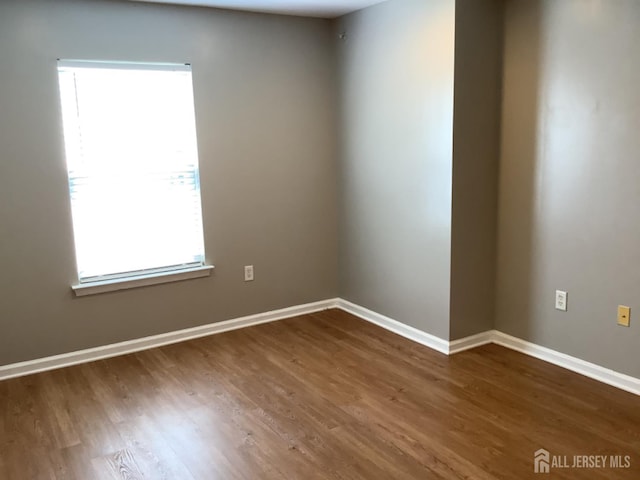 931 Cedar Ct, New Brunswick, NJ 08901 - empty room featuring dark wood-type flooring