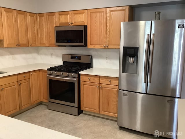 931 Cedar Ct, New Brunswick, NJ 08901 - kitchen featuring stainless steel appliances and light countertops