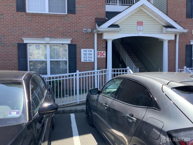 931 Cedar Ct, New Brunswick, NJ 08901 - entrance to property with brick siding