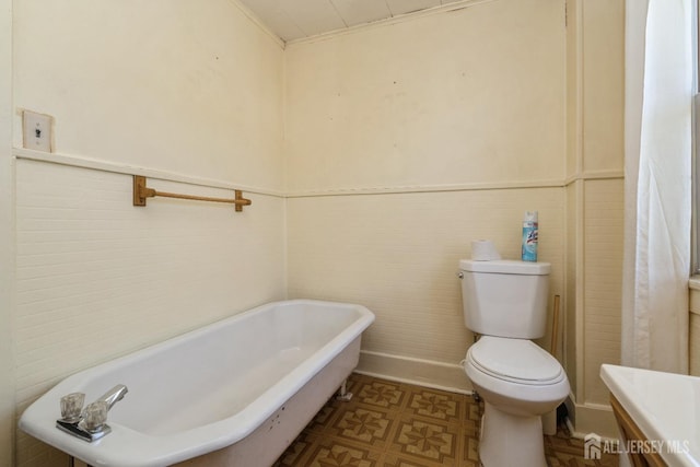 35 Kossman St, East Brunswick, NJ 08816 - bathroom featuring a freestanding bath and wainscoting