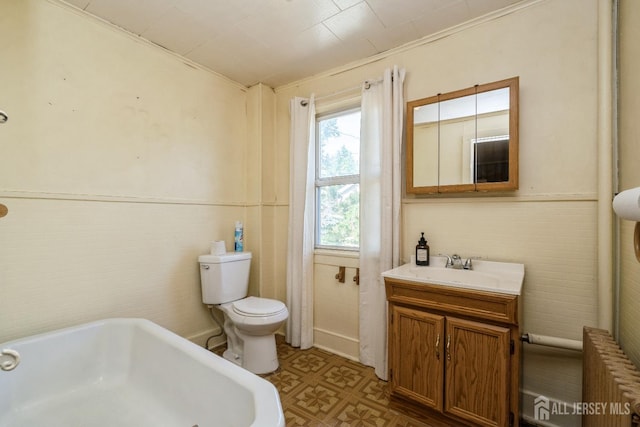 35 Kossman St, East Brunswick, NJ 08816 - full bath featuring tile walls, vanity, a tub to relax in, a wainscoted wall, and radiator heating unit