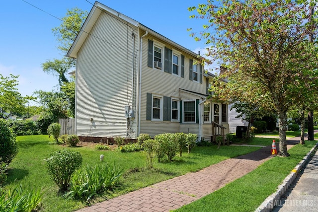 35 Kossman St, East Brunswick, NJ 08816 - view of side of property featuring a yard