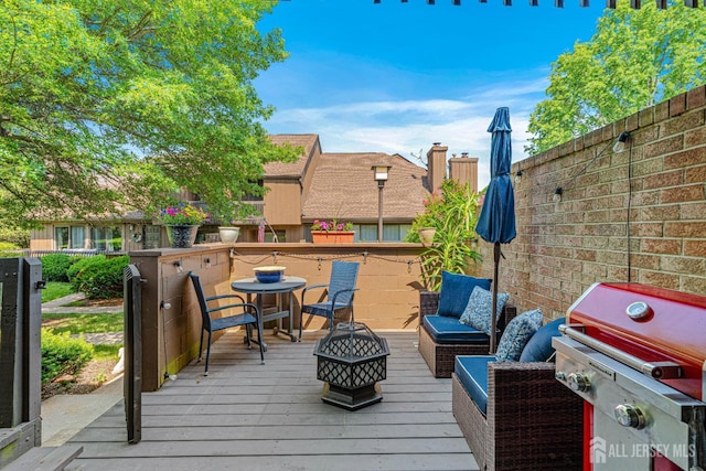 215 Kingsberry Dr, Franklin Twsp, NJ 08873 - wooden terrace featuring area for grilling and an outdoor fire pit