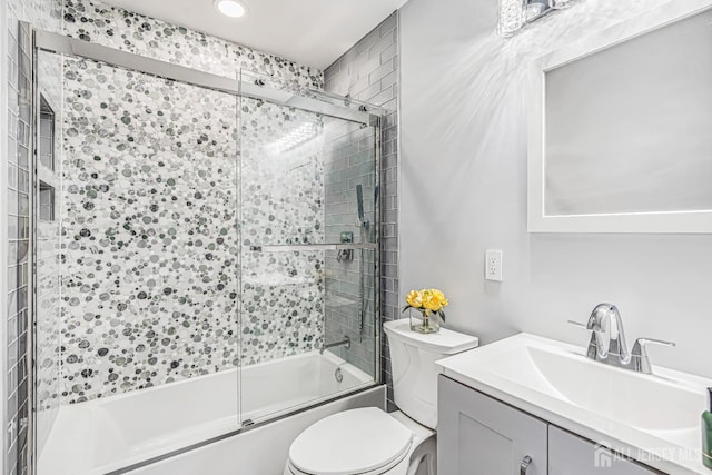 215 Kingsberry Dr, Franklin Twsp, NJ 08873 - bathroom with bath / shower combo with glass door, vanity, and recessed lighting