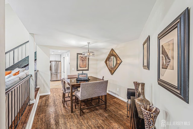 215 Kingsberry Dr, Franklin Twsp, NJ 08873 - dining room featuring wood finished floors and baseboards