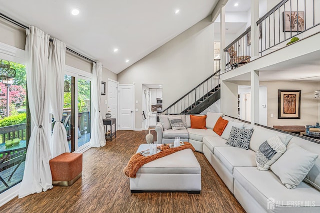 215 Kingsberry Dr, Franklin Twsp, NJ 08873 - living room with high vaulted ceiling, wood finished floors, stairway, and recessed lighting