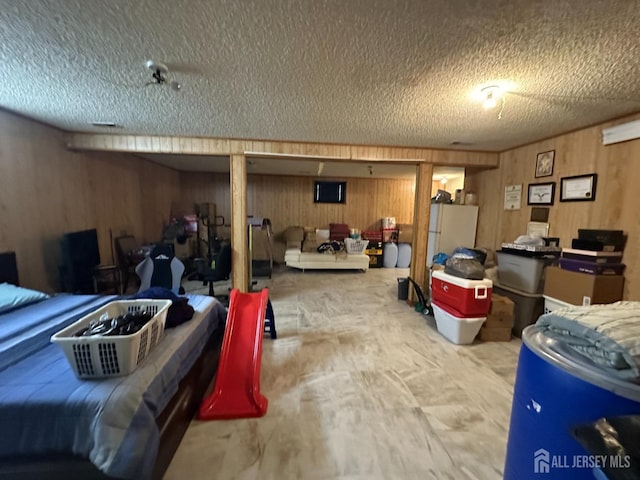 4215 Birchwood Ct, North Brunswick, NJ 08902 - garage with wood walls and freestanding refrigerator