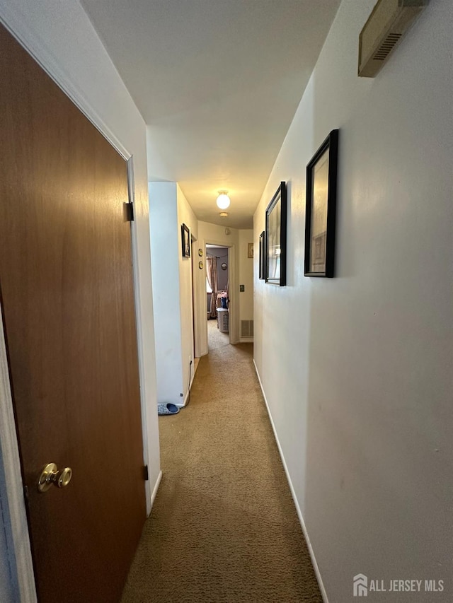4215 Birchwood Ct, North Brunswick, NJ 08902 - hallway featuring light colored carpet and baseboards