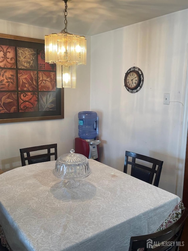 4215 Birchwood Ct, North Brunswick, NJ 08902 - dining area featuring a chandelier