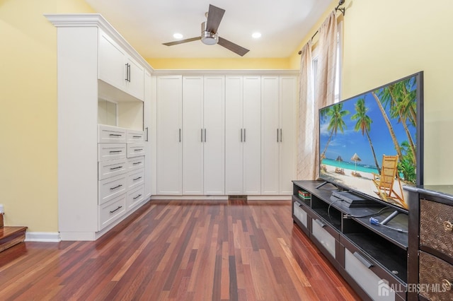 interior space with recessed lighting, dark wood-type flooring, and a ceiling fan