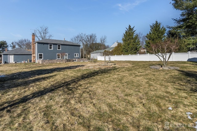 view of yard with fence