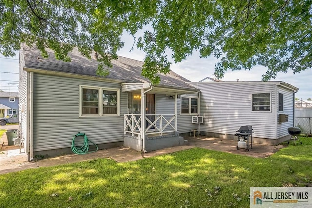 116 Whitman St, Carteret, NJ 07008 - back of house with a lawn, roof with shingles, and cooling unit