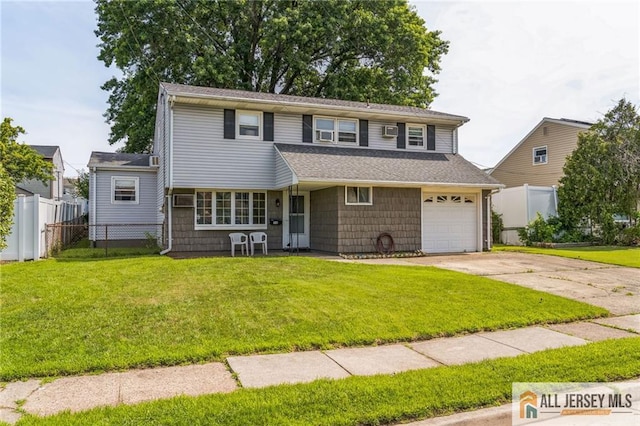 116 Whitman St, Carteret, NJ 07008 - traditional-style home with a garage, concrete driveway, and roof with shingles