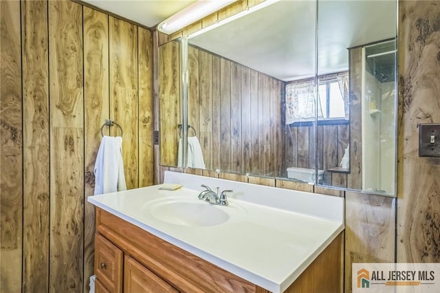 116 Whitman St, Carteret, NJ 07008 - bathroom with vanity and wooden walls