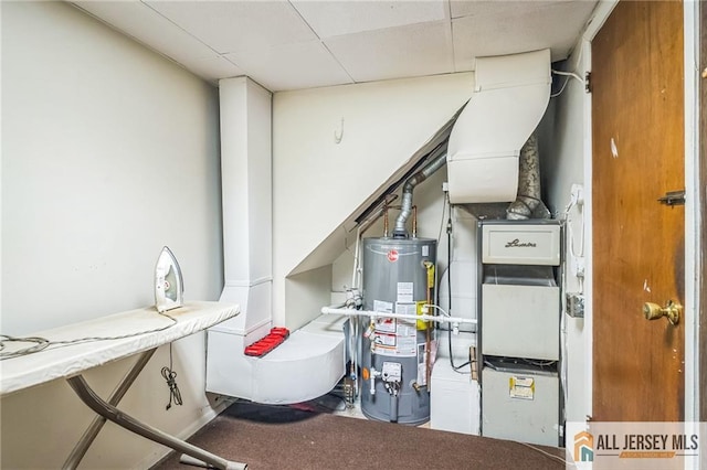 116 Whitman St, Carteret, NJ 07008 - utility room featuring gas water heater