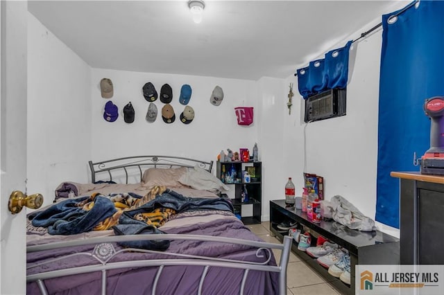 bedroom with tile patterned floors