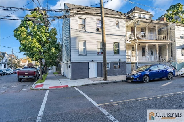 18 Lee Ave, New Brunswick, NJ 08901 - view of building exterior featuring uncovered parking