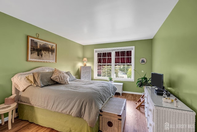 bedroom featuring hardwood / wood-style floors