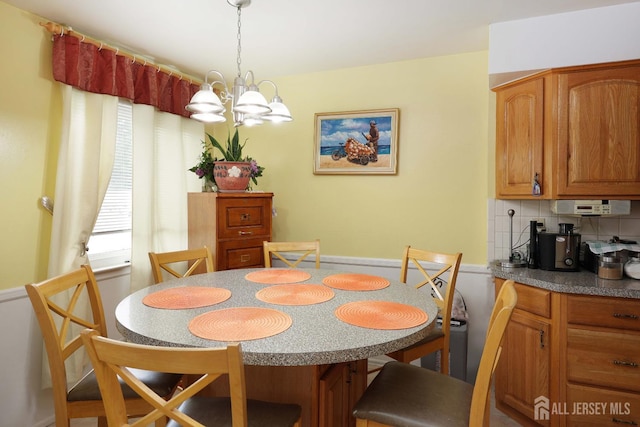 1-G Quincy Cir S, Brunswick, NJ 08810 - dining space featuring a chandelier