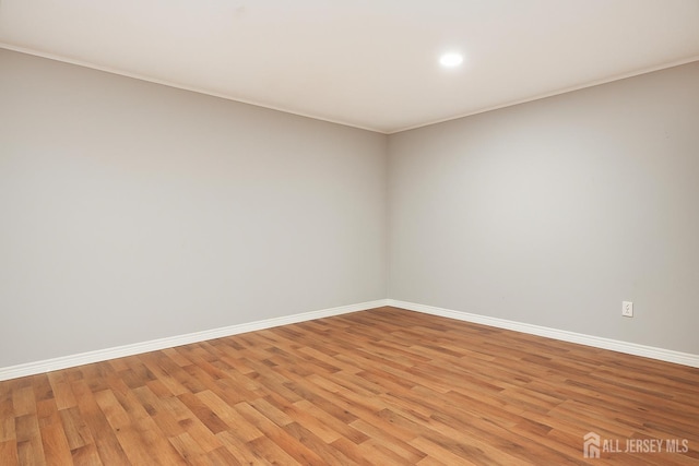 1-G Quincy Cir S, Brunswick, NJ 08810 - unfurnished room featuring light wood-style flooring, recessed lighting, and crown molding