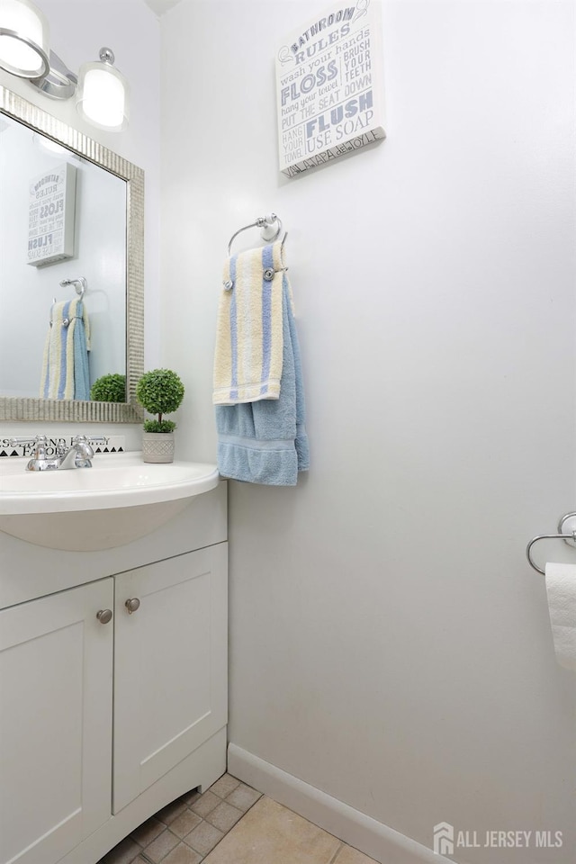 1-G Quincy Cir S, Brunswick, NJ 08810 - bathroom featuring vanity, baseboards, and tile patterned floors