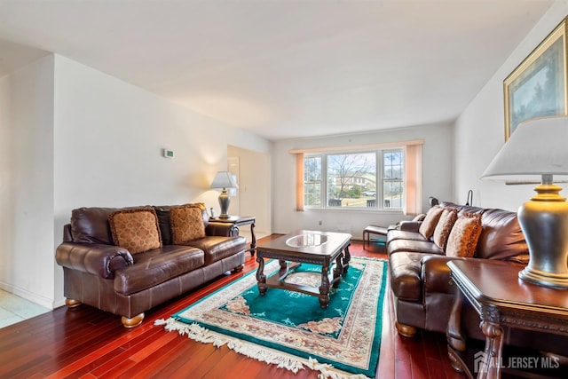 living area with hardwood / wood-style flooring