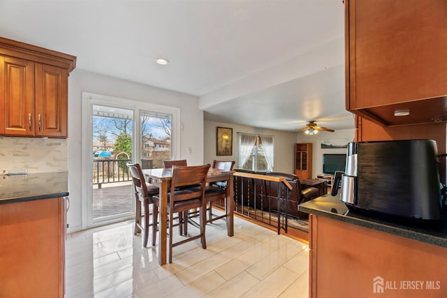 dining room with recessed lighting and a ceiling fan