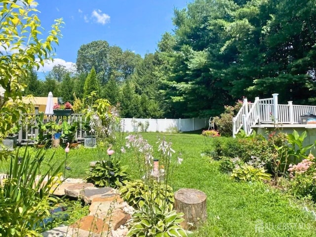 view of yard featuring fence