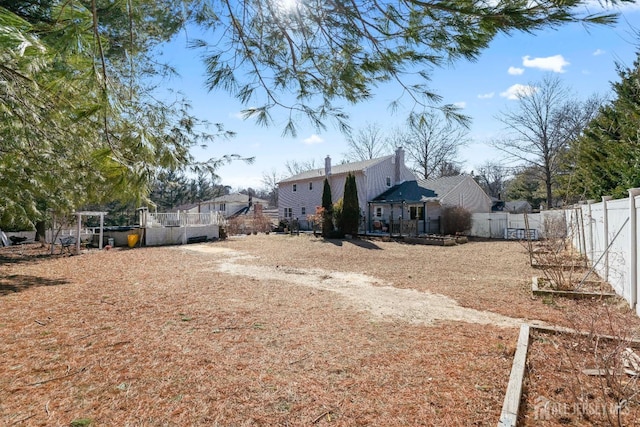 exterior space featuring fence