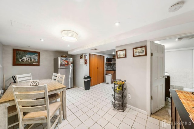 view of tiled dining area