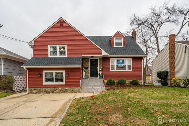 view of front of home with a front yard