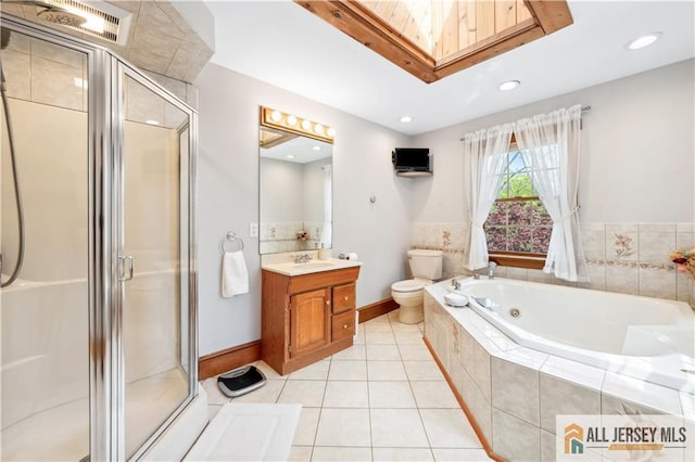 full bathroom featuring a shower stall, a jetted tub, vanity, tile patterned floors, and recessed lighting