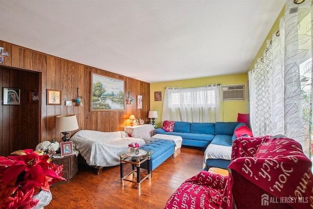 30 Kenmore Rd, Edison, NJ 08817 - living area with wood walls, a wall unit AC, and wood finished floors