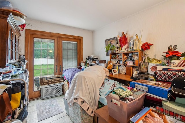 bedroom featuring french doors, access to outside, and ornamental molding